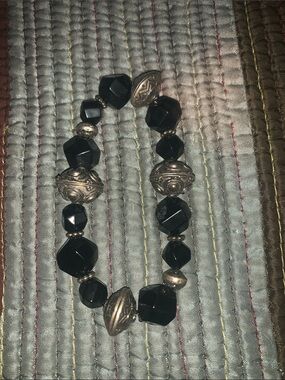 Silver/Onyx faceted bracelet.

Easily vintage
